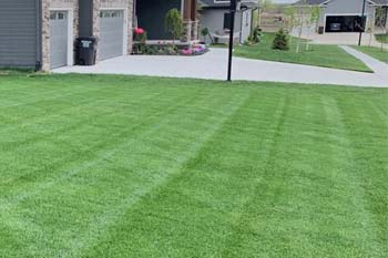 Lincoln home with a professional lawn care service.